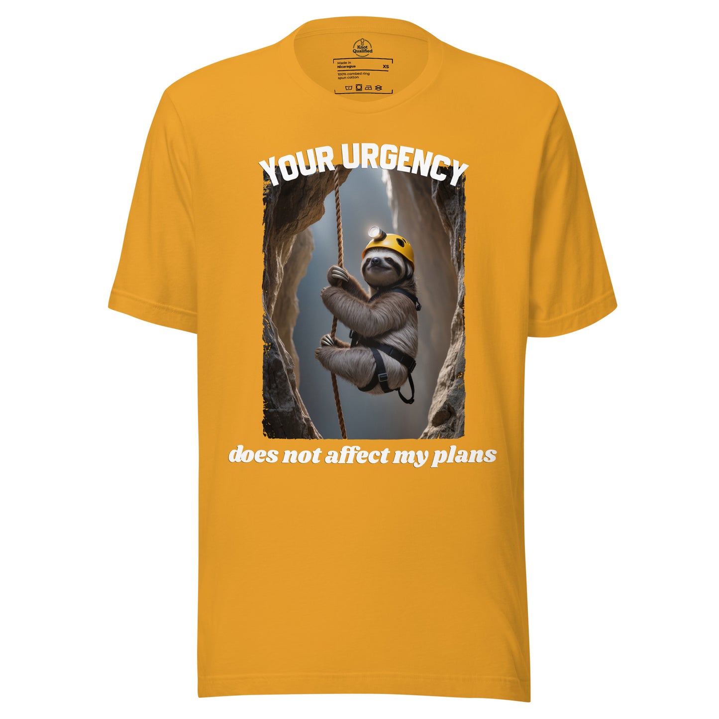 Mustard unisex t-shirt from Knot Qualified featuring the quote "Your urgency does not affect my plans" on the front.