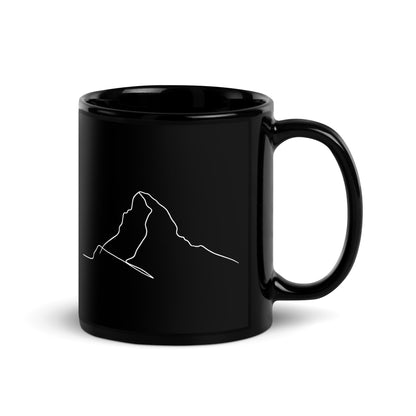Black glossy Matterhorn minimalist line art mug with handle on the right, perfect for coffee lovers by Knot Qualified.