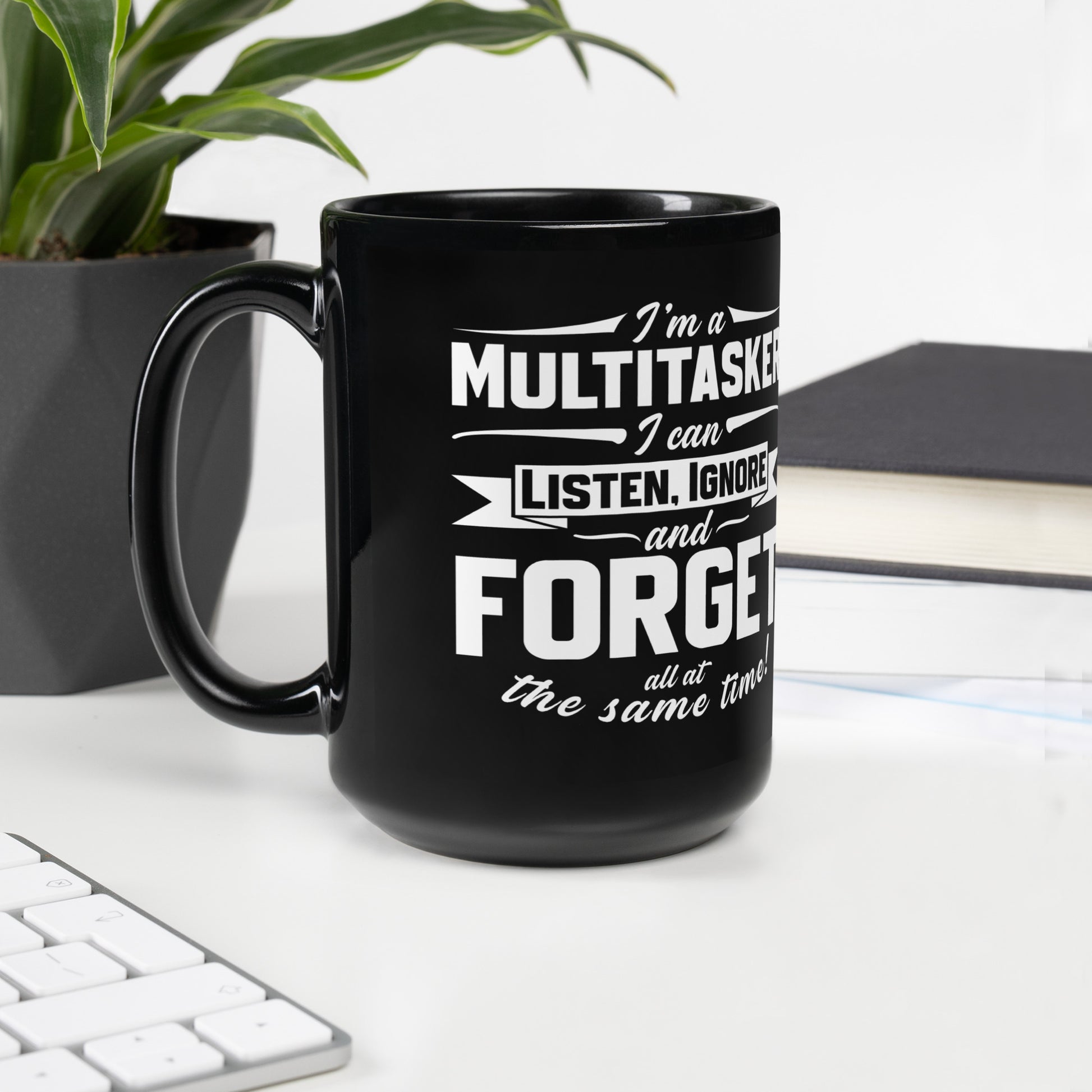 Black glossy 15 oz mug by Knot Qualified with a left-side handle, showcasing a sleek and modern design.