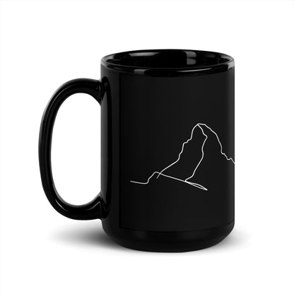 Black glossy Matterhorn minimalist line art mug by Knot Qualified with a handle on the left, perfect for coffee.