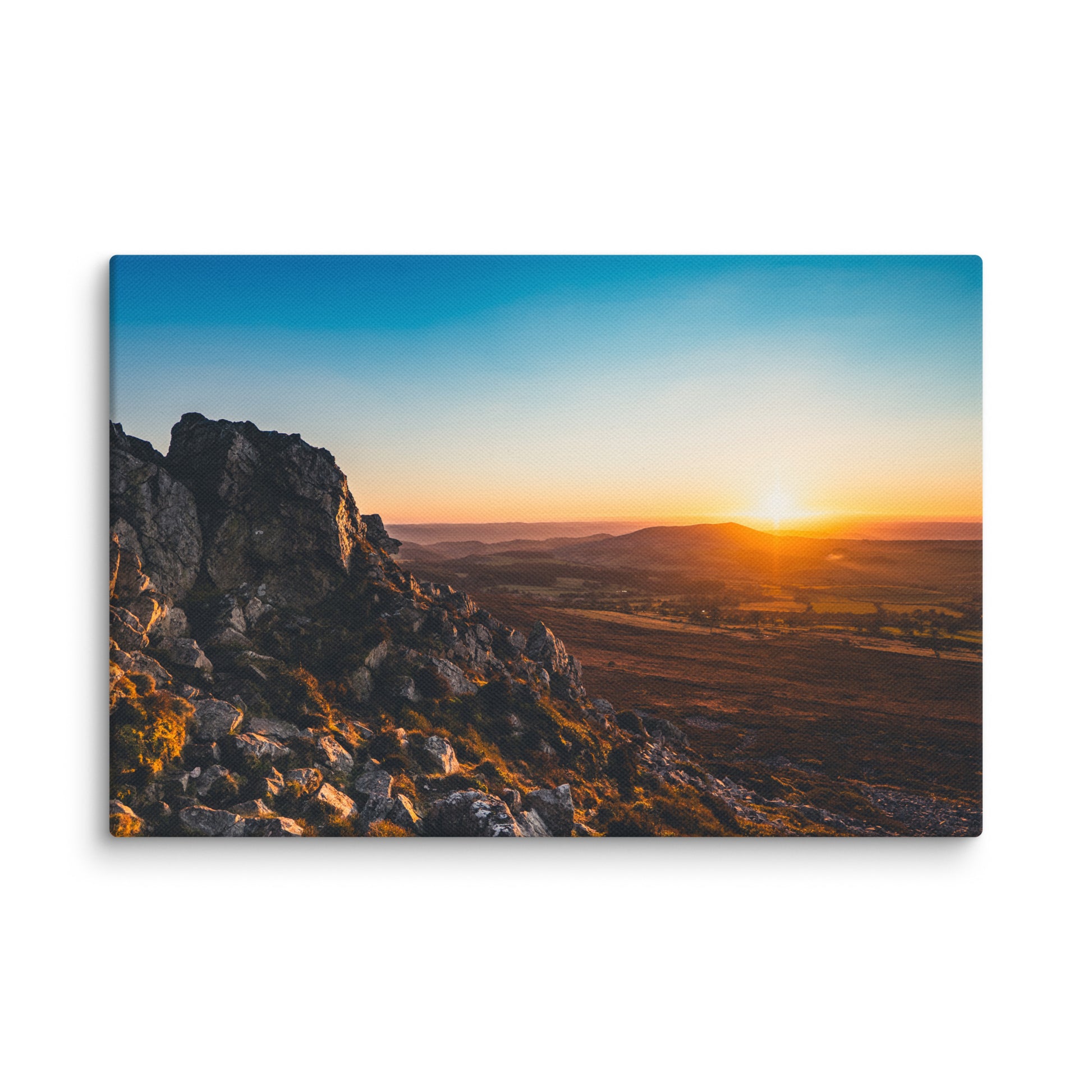 Canvas print of a sunset over the Stiperstones in Shropshire by Knot Qualified, featuring vibrant colors and scenic landscape.