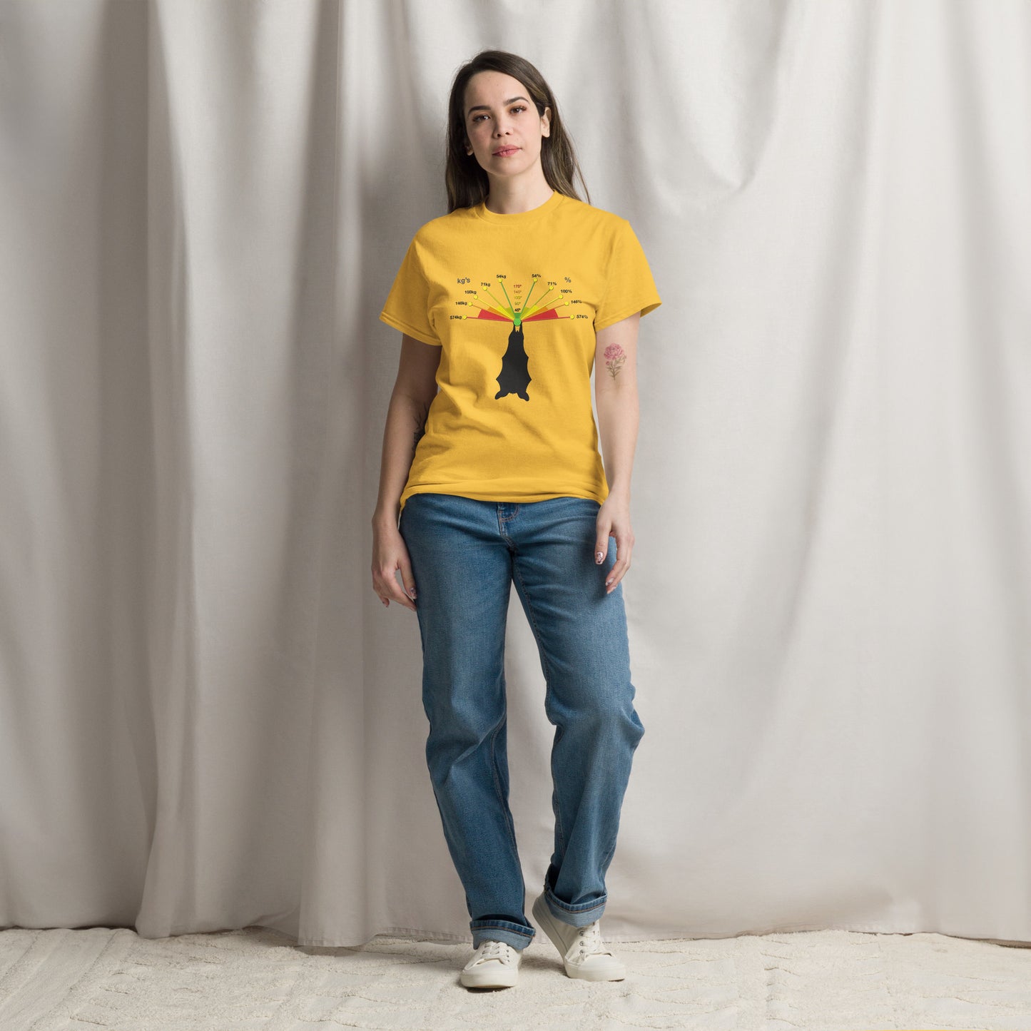 Unisex classic tee featuring a caving bat graphic design by Knot Qualified on a daisy background.