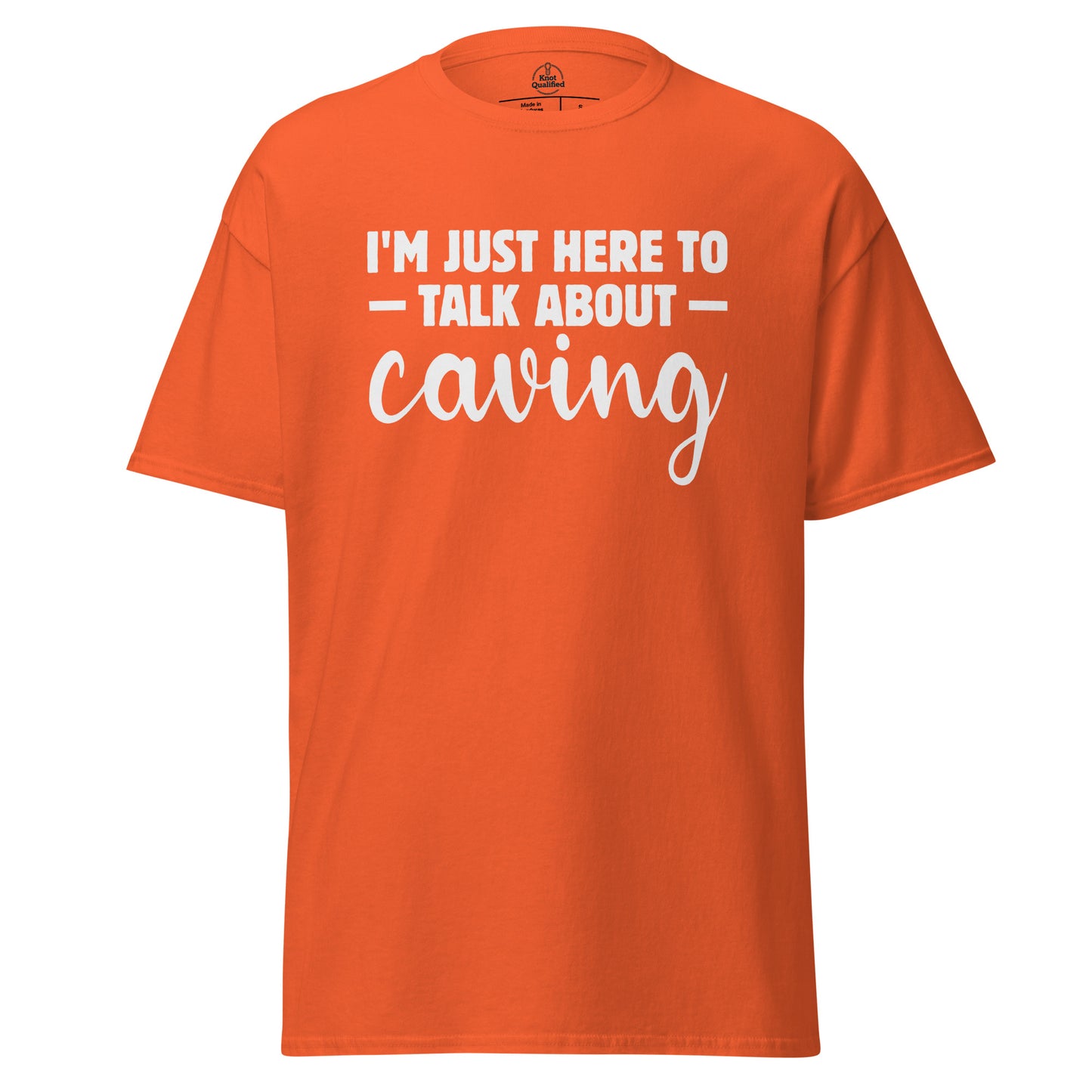 Unisex orange t-shirt from Knot Qualified featuring "I'm Just Here to Talk About Caving" text design on the front.
