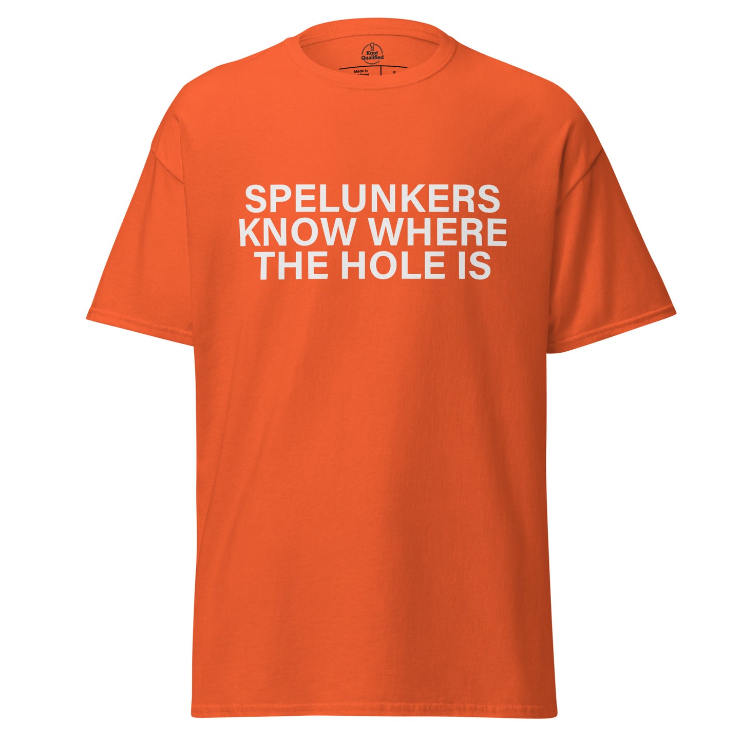 Unisex orange T-shirt from Knot Qualified featuring "Spelunkers Know Where The Hole Is" graphic on the front.