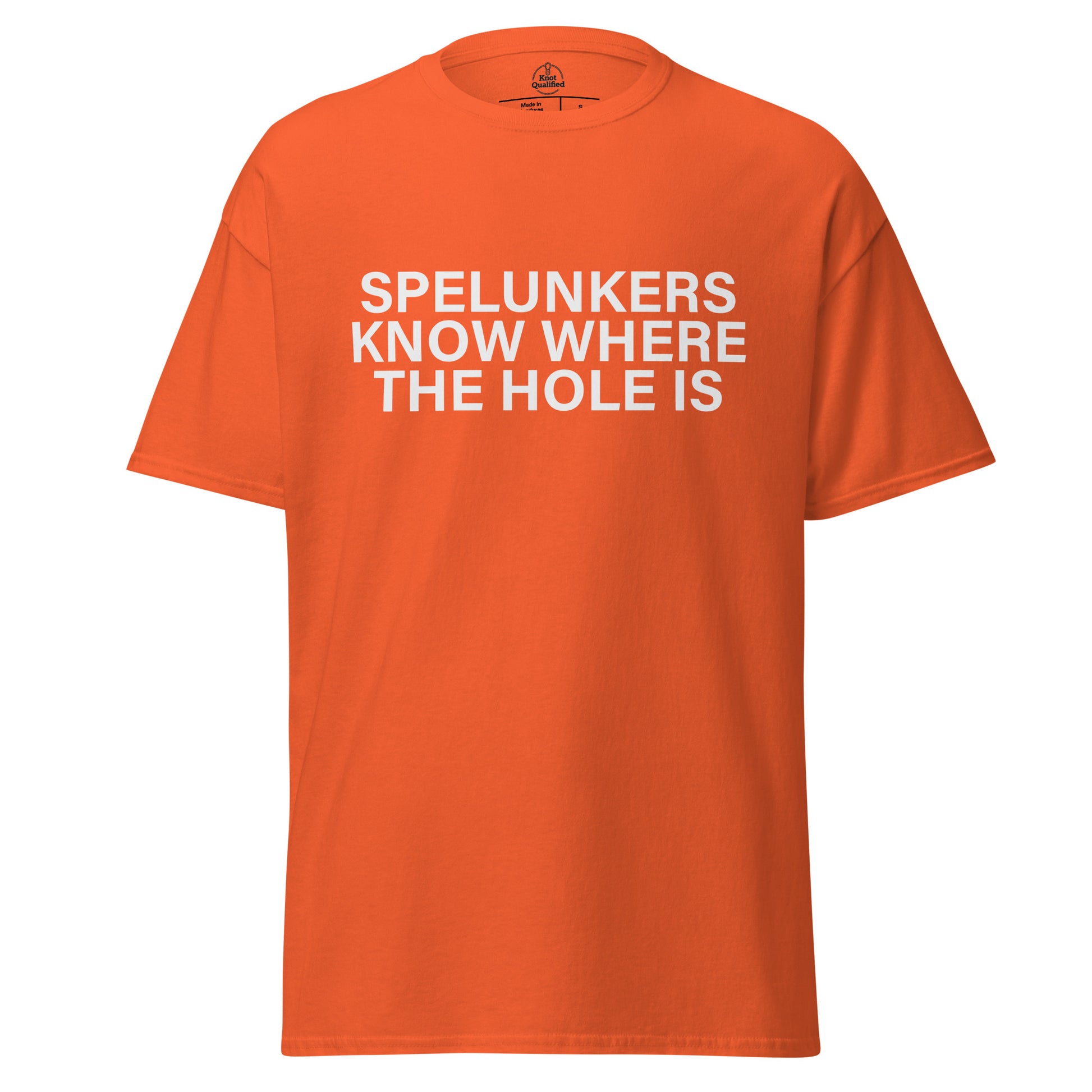 Unisex orange T-shirt from Knot Qualified featuring "Spelunkers Know Where The Hole Is" graphic on the front.