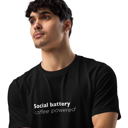 Black unisex eco t-shirt featuring "Social Battery Coffee Powered" graphic by Knot Qualified, front view.