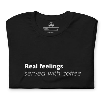 Black unisex eco t-shirt by Knot Qualified featuring "Real Feelings Served With Coffee" graphic on the front.