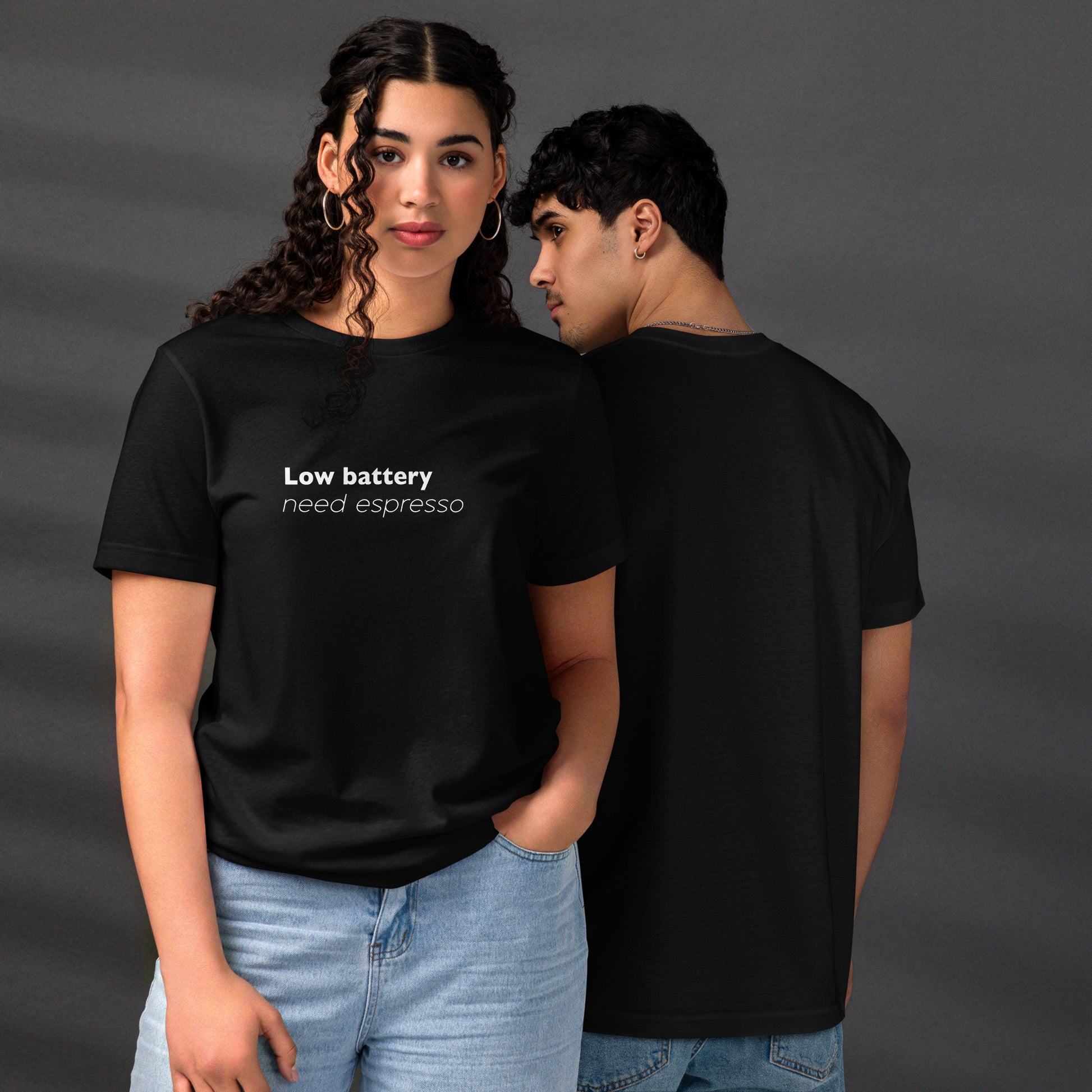 Black unisex premium eco t-shirt featuring "Low Battery Need Espresso" graphic on front and back by Knot Qualified.