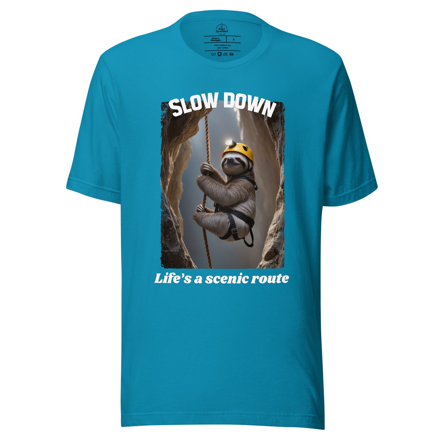 Aqua unisex t-shirt from Knot Qualified featuring "Slow down Life’s a scenic route" graphic on the front.