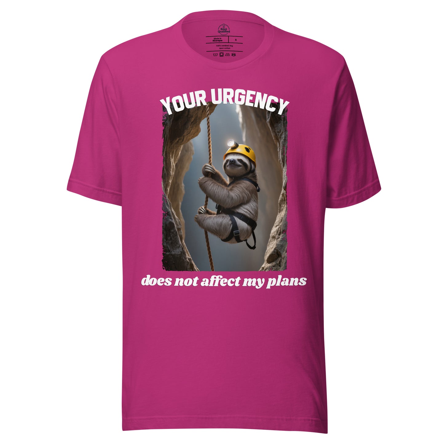 Unisex berry t-shirt from Knot Qualified featuring the phrase "Your urgency does not affect my plans" on the front.
