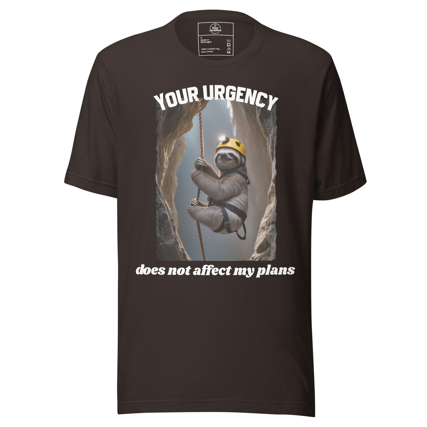 Brown unisex T-shirt by Knot Qualified featuring "Your urgency does not affect my plans" printed on the front.