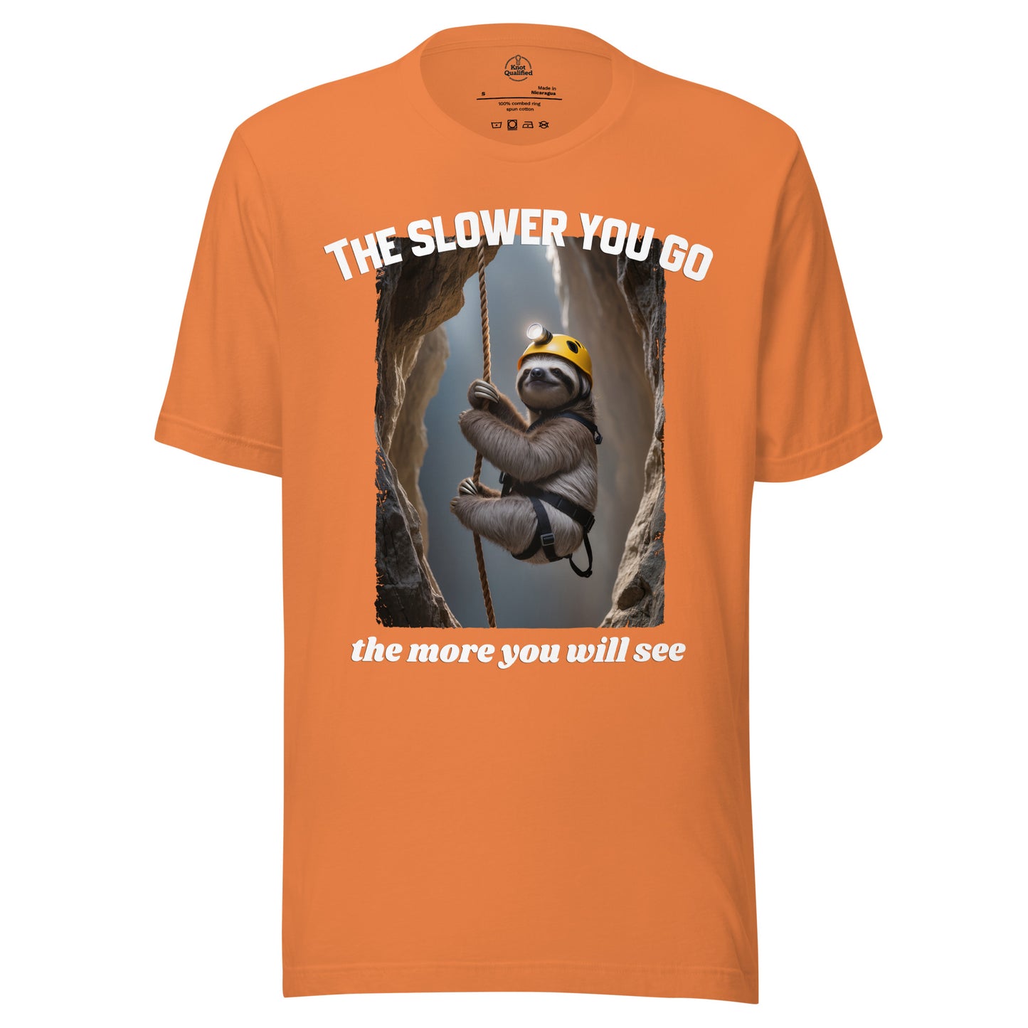 Burnt orange unisex T-shirt from Knot Qualified featuring "The slower you go - the more you will see" graphic design.