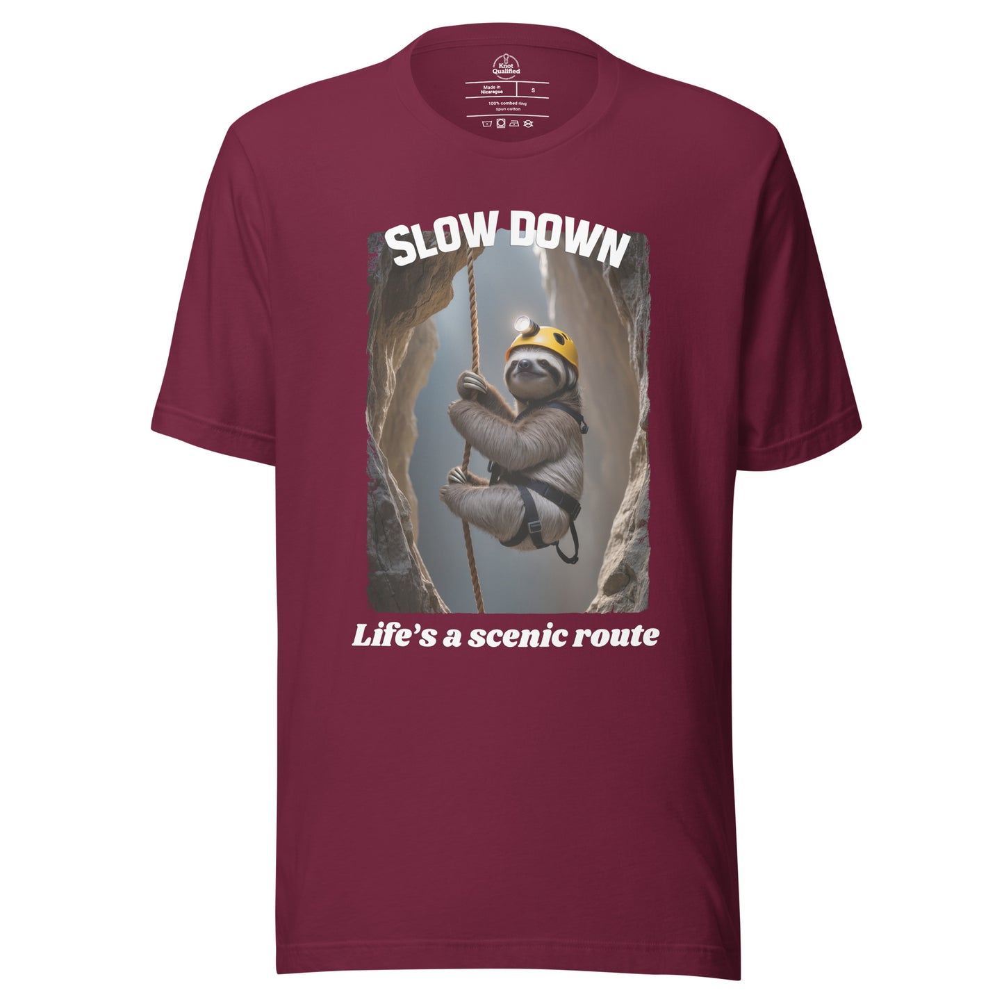 Maroon unisex t-shirt by Knot Qualified featuring "Slow down Life’s a scenic route" graphic on the front.