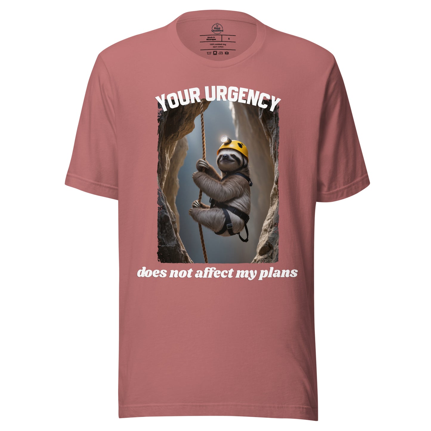 Mauve unisex t-shirt from Knot Qualified featuring the phrase "Your urgency does not affect my plans" on the front.