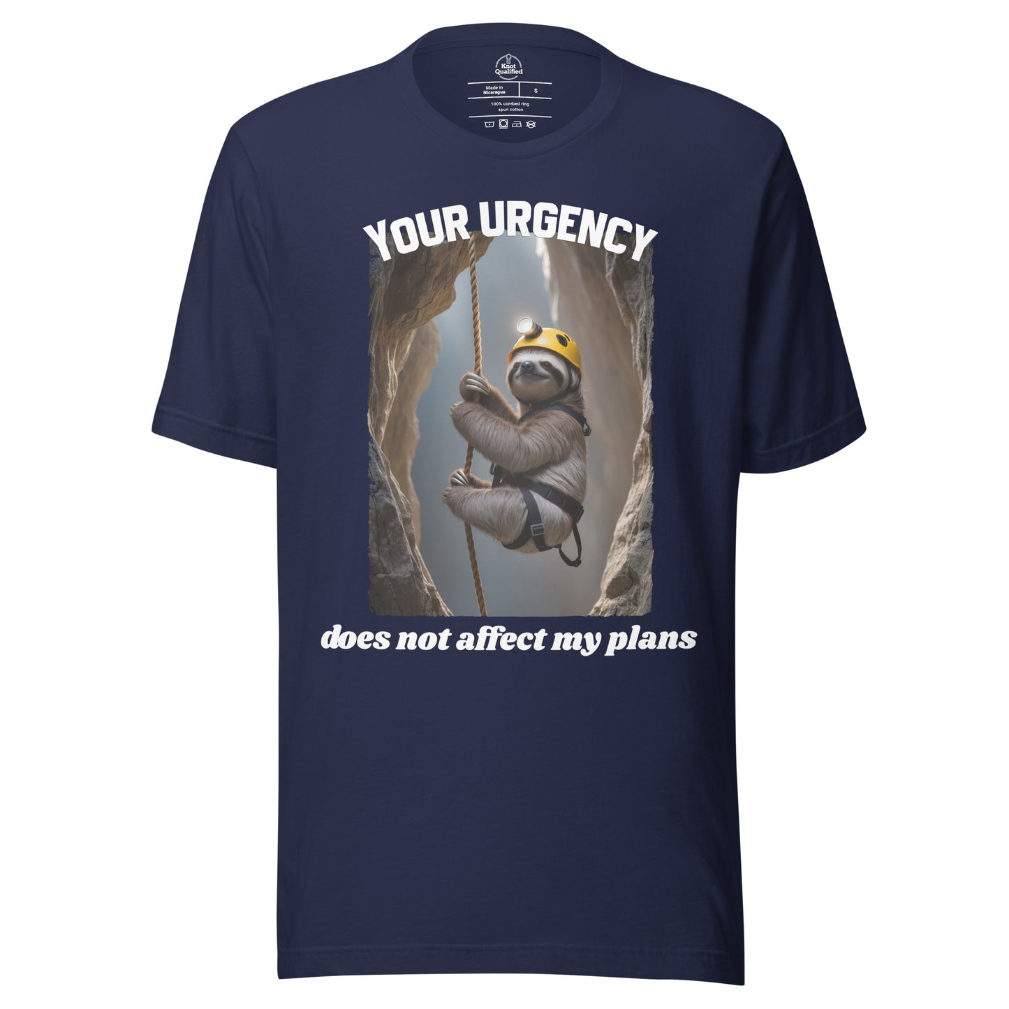 Navy unisex t-shirt from Knot Qualified featuring the phrase "Your urgency does not affect my plans" on the front.